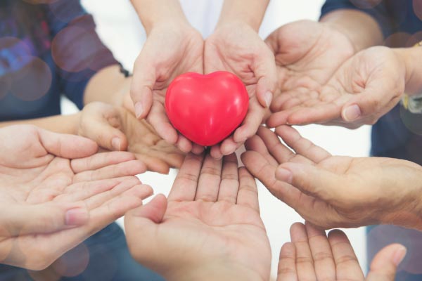 Holding heart shape for health care
